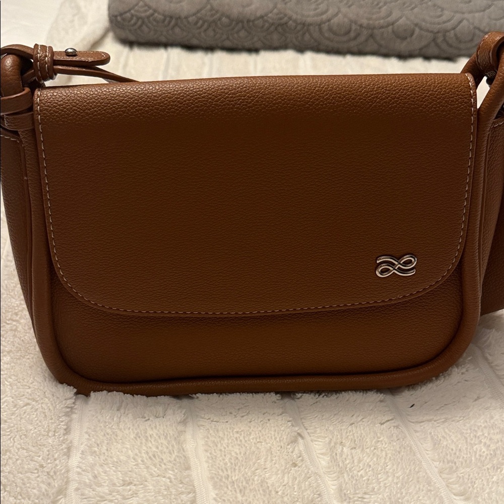 Elegant Brown Crossbody Bag with Silver Detail